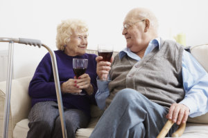 two elderly drinking